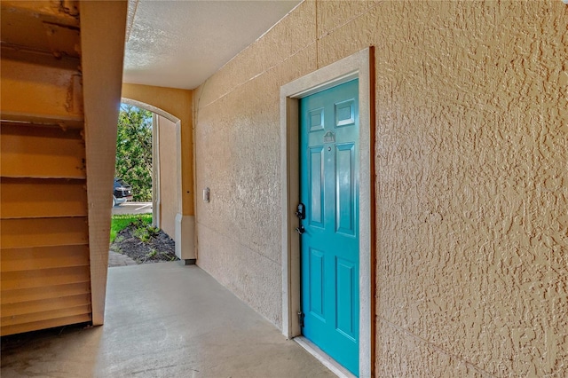 2773 Via Cipriani Unit 1310A, Clearwater, FL 33764 - property entrance with stucco siding