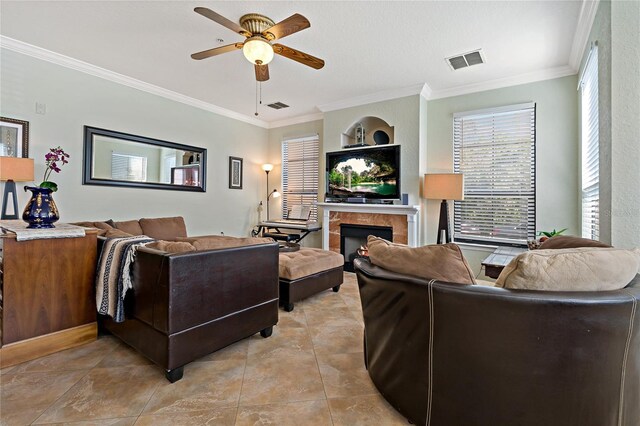 2773 Via Cipriani Unit 1310A, Clearwater, FL 33764 - living area with a ceiling fan, crown molding, and a fireplace