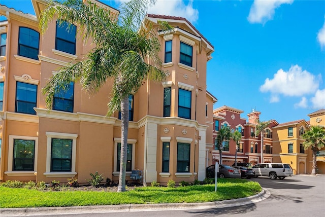 2773 Via Cipriani Unit 1310A, Clearwater, FL 33764 - view of building exterior with a residential view