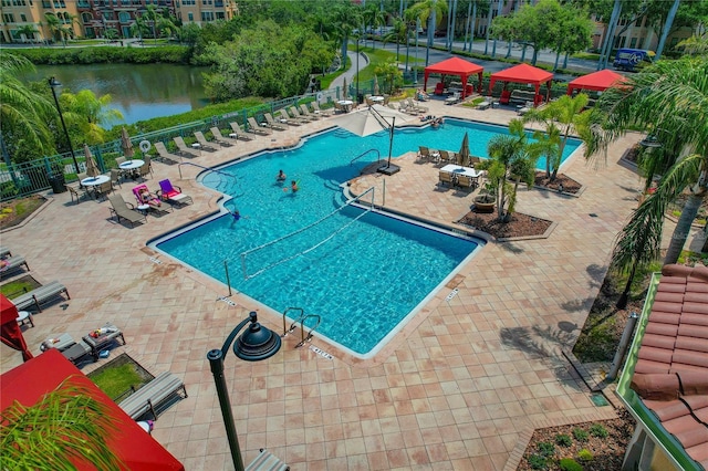 2773 Via Cipriani Unit 1310A, Clearwater, FL 33764 - community pool featuring a patio area, a gazebo, and a water view