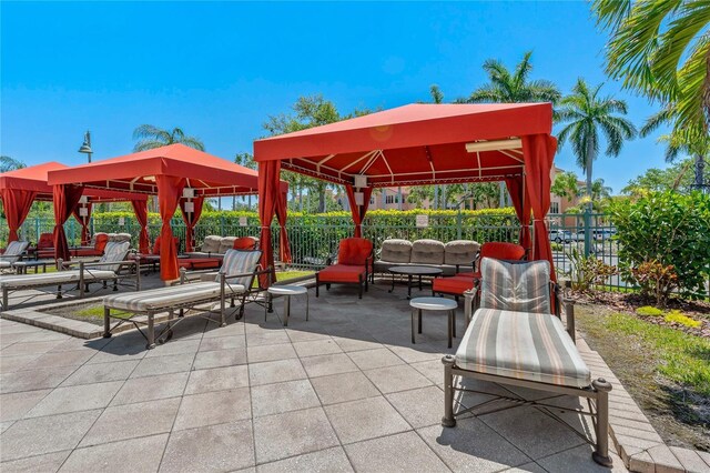 2773 Via Cipriani Unit 1310A, Clearwater, FL 33764 - view of patio / terrace featuring a gazebo and an outdoor hangout area
