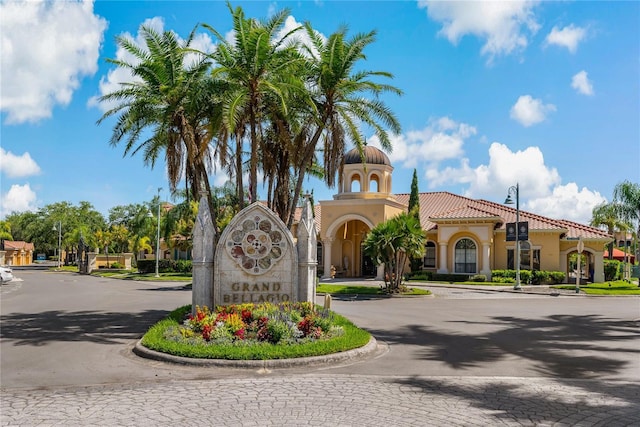 2773 Via Cipriani Unit 1310A, Clearwater, FL 33764 - community / neighborhood sign with curved driveway