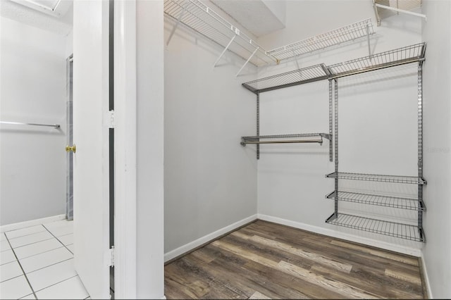 16109 Rambling Vine Dr E, Tampa, FL 33624 - spacious closet with wood finished floors
