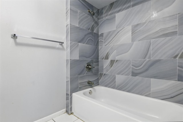 16109 Rambling Vine Dr E, Tampa, FL 33624 - bathroom featuring bathtub / shower combination, tile patterned floors, and baseboards