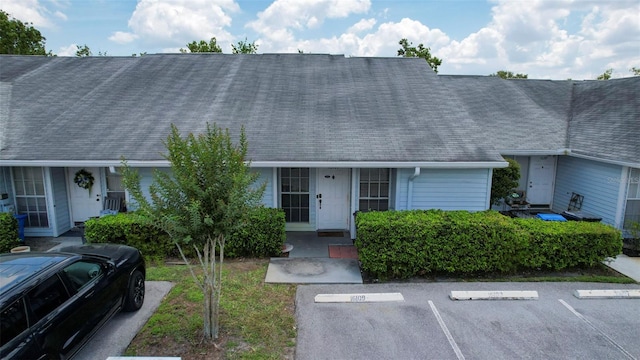 16109 Rambling Vine Dr E, Tampa, FL 33624 - view of front of house with uncovered parking