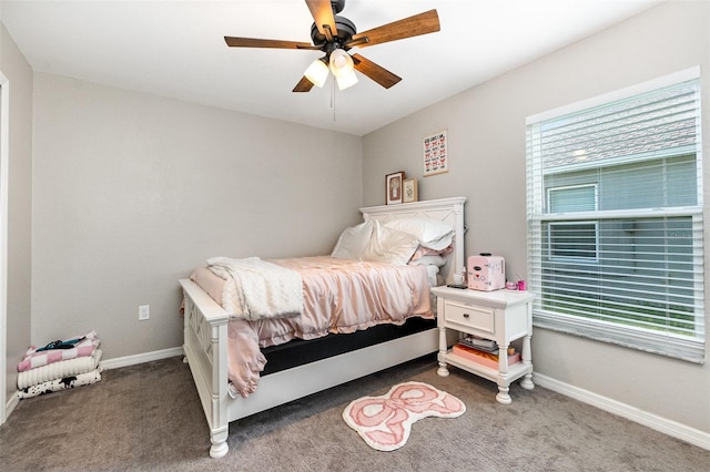 6050 Eagle Pointe Dr, Lakeland, FL 33812 - carpeted bedroom featuring baseboards and ceiling fan