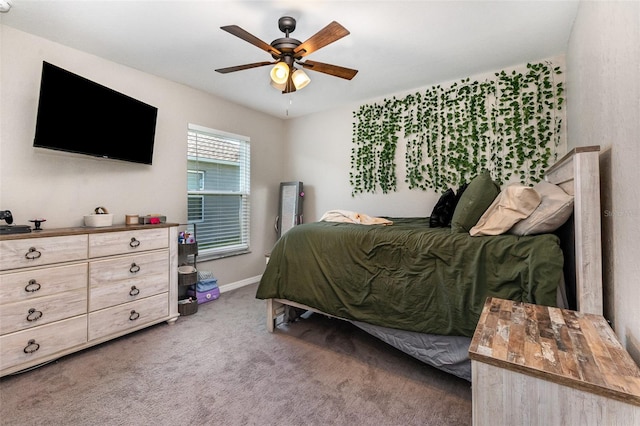 6050 Eagle Pointe Dr, Lakeland, FL 33812 - bedroom featuring carpet floors, a ceiling fan, and baseboards