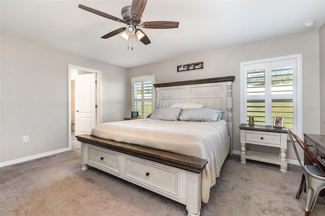 6050 Eagle Pointe Dr, Lakeland, FL 33812 - bedroom featuring carpet, baseboards, a ceiling fan, and connected bathroom