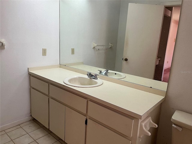 8130 Shalom Dr, Spring Hill, FL 34606 - half bathroom featuring vanity, toilet, and tile patterned flooring