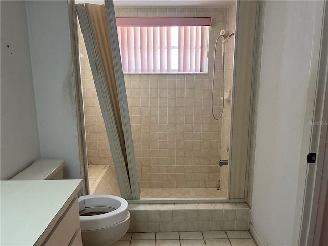 8130 Shalom Dr, Spring Hill, FL 34606 - bathroom with toilet, a stall shower, tile patterned floors, and vanity