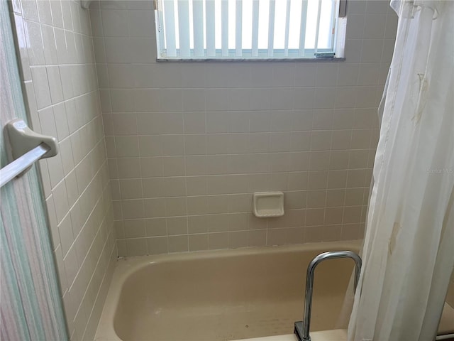 8130 Shalom Dr, Spring Hill, FL 34606 - bathroom with shower / tub combo with curtain