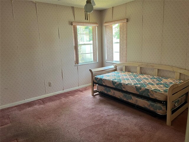 8130 Shalom Dr, Spring Hill, FL 34606 - carpeted bedroom with baseboards