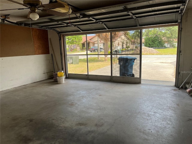 8130 Shalom Dr, Spring Hill, FL 34606 - garage featuring ceiling fan