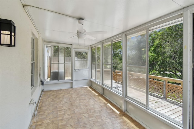 2742 Wilson Ct, Palm Harbor, FL 34684 - unfurnished sunroom with a ceiling fan