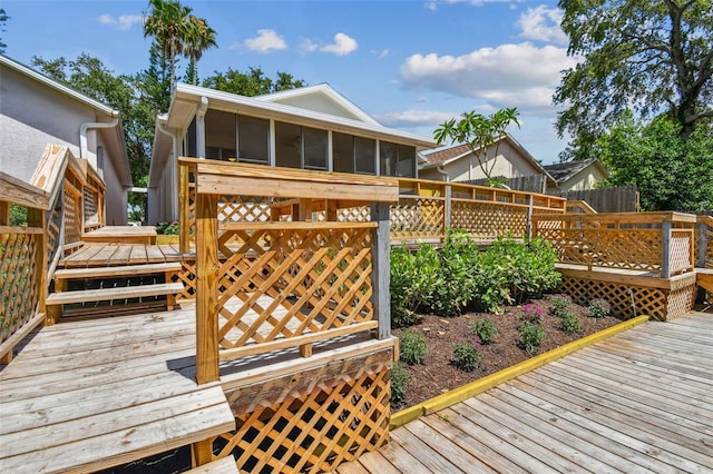 2742 Wilson Ct, Palm Harbor, FL 34684 - wooden terrace featuring a sunroom