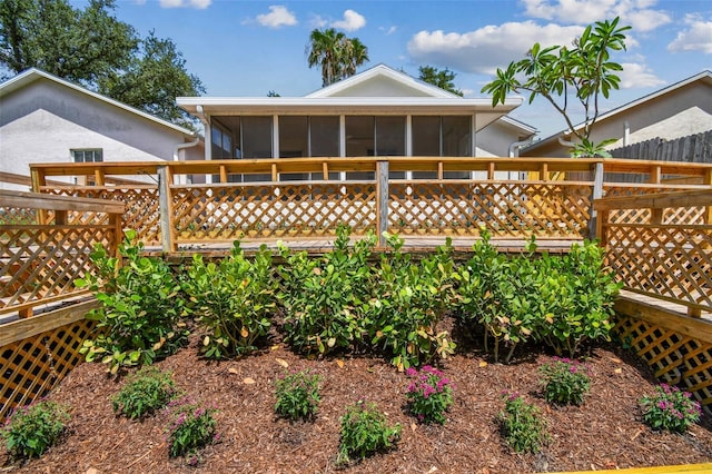 2742 Wilson Ct, Palm Harbor, FL 34684 - rear view of property with a sunroom