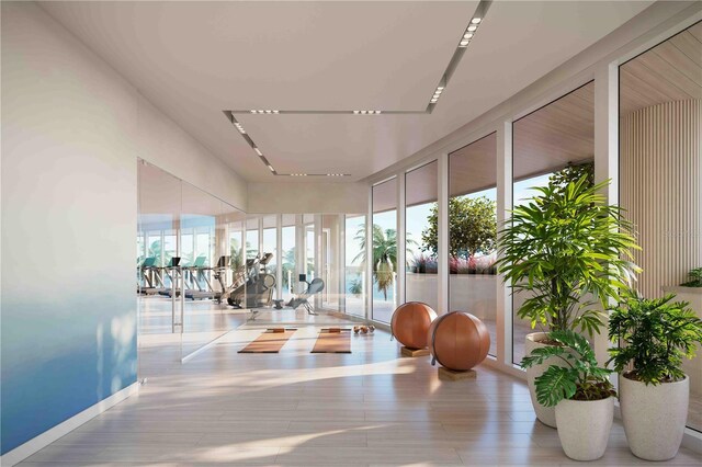 805 S Gulfview Blvd Unit 701B, Clearwater, FL 33767 - gym with healthy amount of natural light and wood finished floors