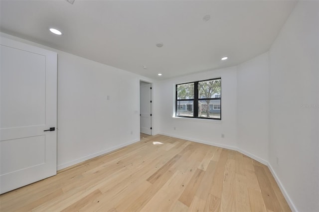 1801 N Morgan St Unit 5, Tampa, FL 33602 - spare room featuring light wood-style flooring, recessed lighting, and baseboards