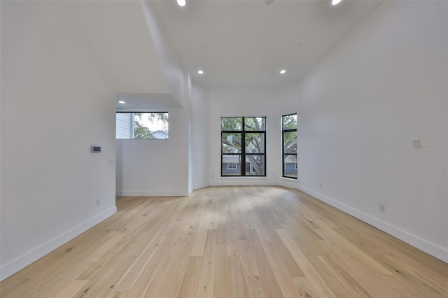 1801 N Morgan St Unit 5, Tampa, FL 33602 - unfurnished room featuring healthy amount of natural light, light wood-type flooring, recessed lighting, and baseboards