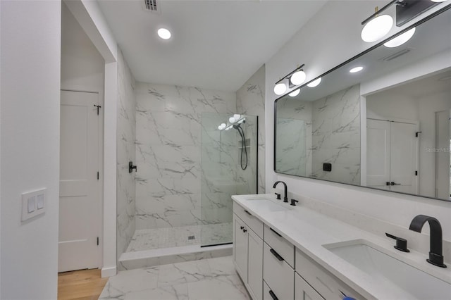 1801 N Morgan St Unit 5, Tampa, FL 33602 - bathroom featuring a marble finish shower, recessed lighting, marble finish floors, and double vanity