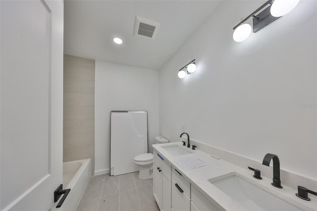 1801 N Morgan St Unit 5, Tampa, FL 33602 - bathroom featuring toilet, tile patterned floors, double vanity, and recessed lighting