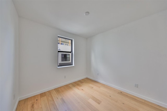 1801 N Morgan St Unit 5, Tampa, FL 33602 - spare room with light wood finished floors and baseboards
