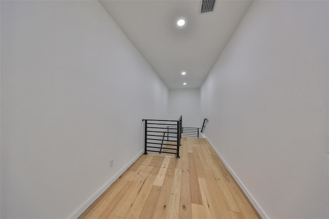 1801 N Morgan St Unit 5, Tampa, FL 33602 - hall with an upstairs landing, recessed lighting, baseboards, and light wood finished floors
