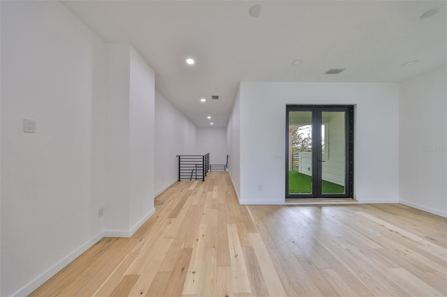 1801 N Morgan St Unit 5, Tampa, FL 33602 - empty room featuring light wood-style flooring, baseboards, and recessed lighting