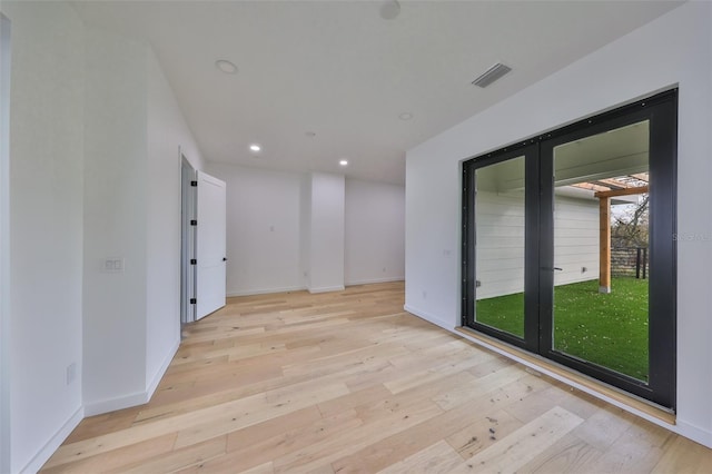 1801 N Morgan St Unit 5, Tampa, FL 33602 - spare room with light wood-type flooring, recessed lighting, and baseboards