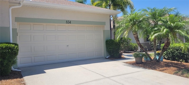 834 Tremont Greens Ln Unit 137, Sun City Center, FL 33573 - garage featuring concrete driveway
