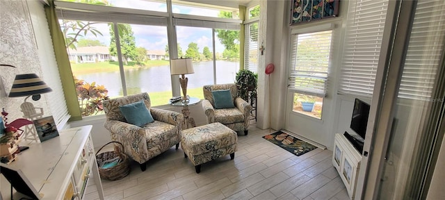 834 Tremont Greens Ln Unit 137, Sun City Center, FL 33573 - sunroom with wood finished floors