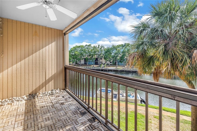 6309 Newtown Cir Unit 9B2, Tampa, FL 33615 - balcony with a water view and a ceiling fan