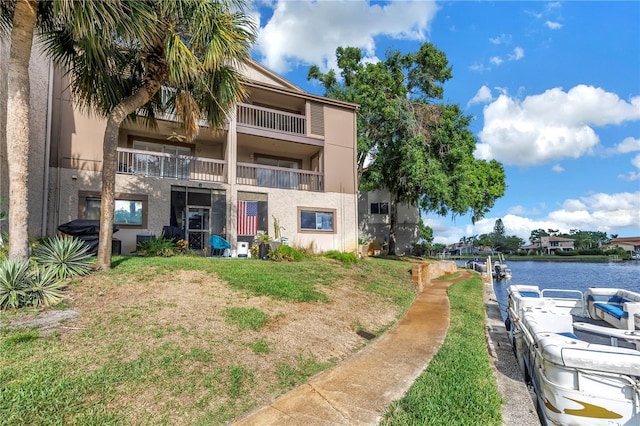 6309 Newtown Cir Unit 9B2, Tampa, FL 33615 - view of building exterior with a water view