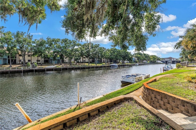 6309 Newtown Cir Unit 9B2, Tampa, FL 33615 - water view featuring a dock