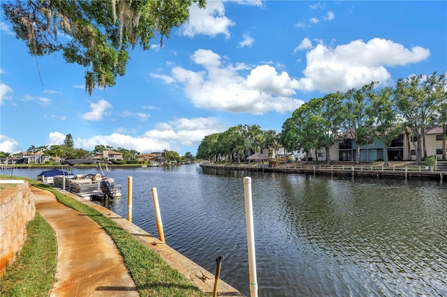 6309 Newtown Cir Unit 9B2, Tampa, FL 33615 - dock featuring a water view and a residential view