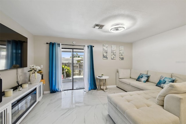 4017 Cedar Limb Ct, Tampa, FL 33614 - living room with marble look tiles and baseboards