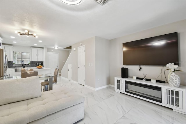 4017 Cedar Limb Ct, Tampa, FL 33614 - living area with light marble finish floors, baseboards, and recessed lighting