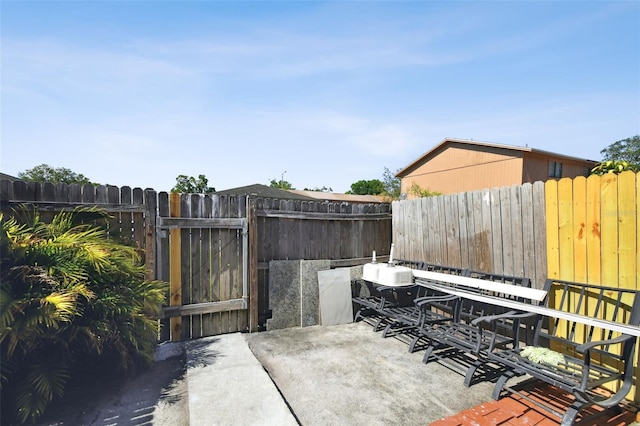 4017 Cedar Limb Ct, Tampa, FL 33614 - view of patio / terrace featuring a gate