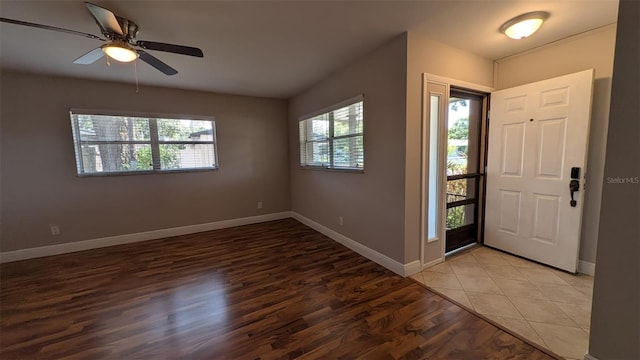 4021 19th St N, Saint Petersburg, FL 33714 - entrance foyer featuring light wood-style flooring, baseboards, and a ceiling fan