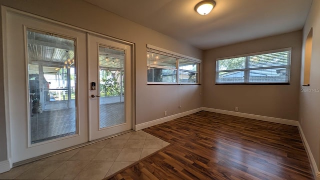 4021 19th St N, Saint Petersburg, FL 33714 - doorway featuring wood finished floors and baseboards