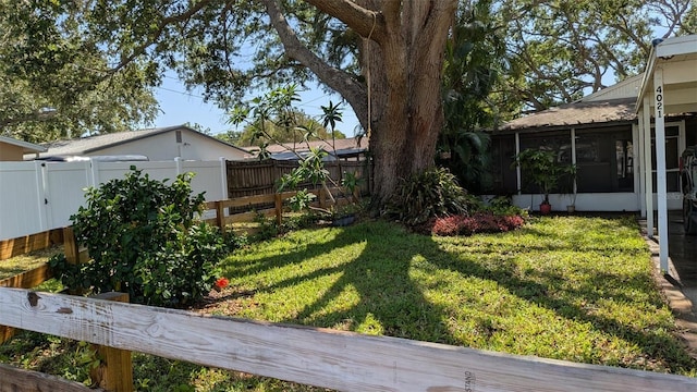 4021 19th St N, Saint Petersburg, FL 33714 - view of yard with a sunroom