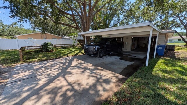 4021 19th St N, Saint Petersburg, FL 33714 - garage featuring cooling unit