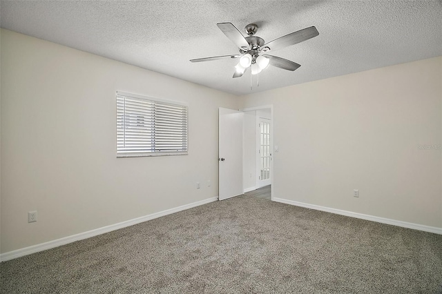 9755 SE 176th St, Summerfield, FL 34491 - empty room featuring a ceiling fan, carpet, a textured ceiling, and baseboards