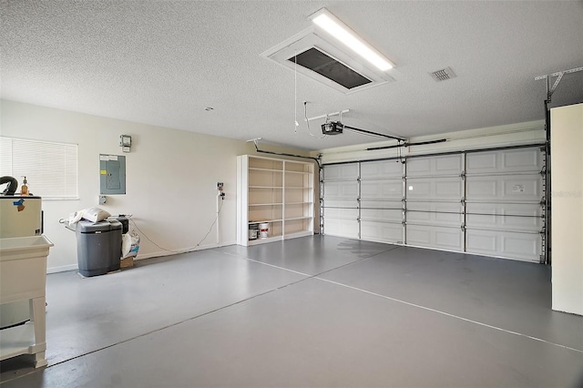 9755 SE 176th St, Summerfield, FL 34491 - garage with electric panel and a garage door opener