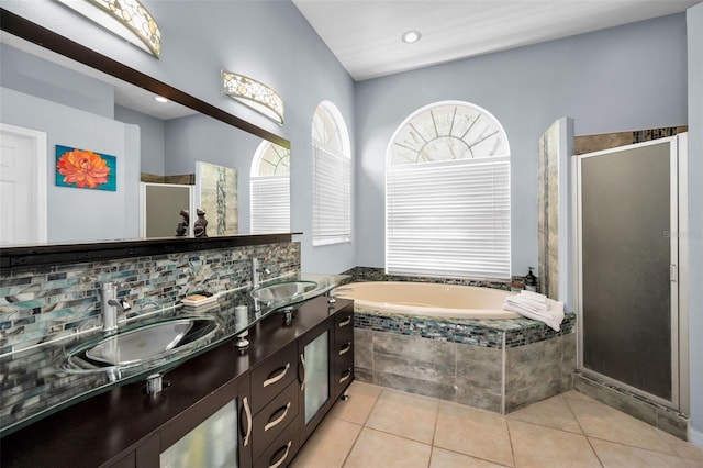 1516 E Lake Woodlands Pkwy, Oldsmar, FL 34677 - bathroom with plenty of natural light, a stall shower, a bath, and double vanity