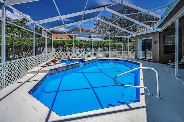 1516 E Lake Woodlands Pkwy, Oldsmar, FL 34677 - view of swimming pool featuring a patio area, a lanai, and a pool with connected hot tub