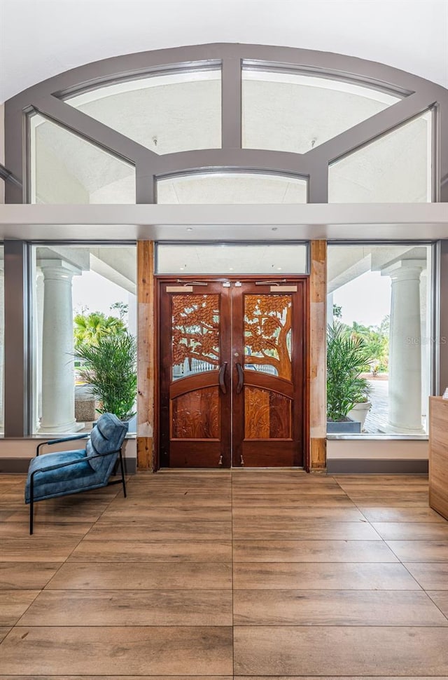 1516 E Lake Woodlands Pkwy, Oldsmar, FL 34677 - foyer featuring wood finished floors