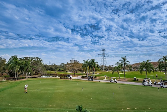 1516 E Lake Woodlands Pkwy, Oldsmar, FL 34677 - view of community featuring a putting green and view of golf course
