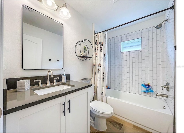 12010 Jackson Landing Pl, Tampa, FL 33624 - bathroom featuring vanity, toilet, shower / tub combo with curtain, and tile patterned flooring