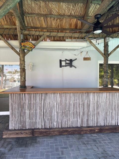 12055 4th St E, Treasure Island, FL 33706 - view of patio / terrace featuring a ceiling fan